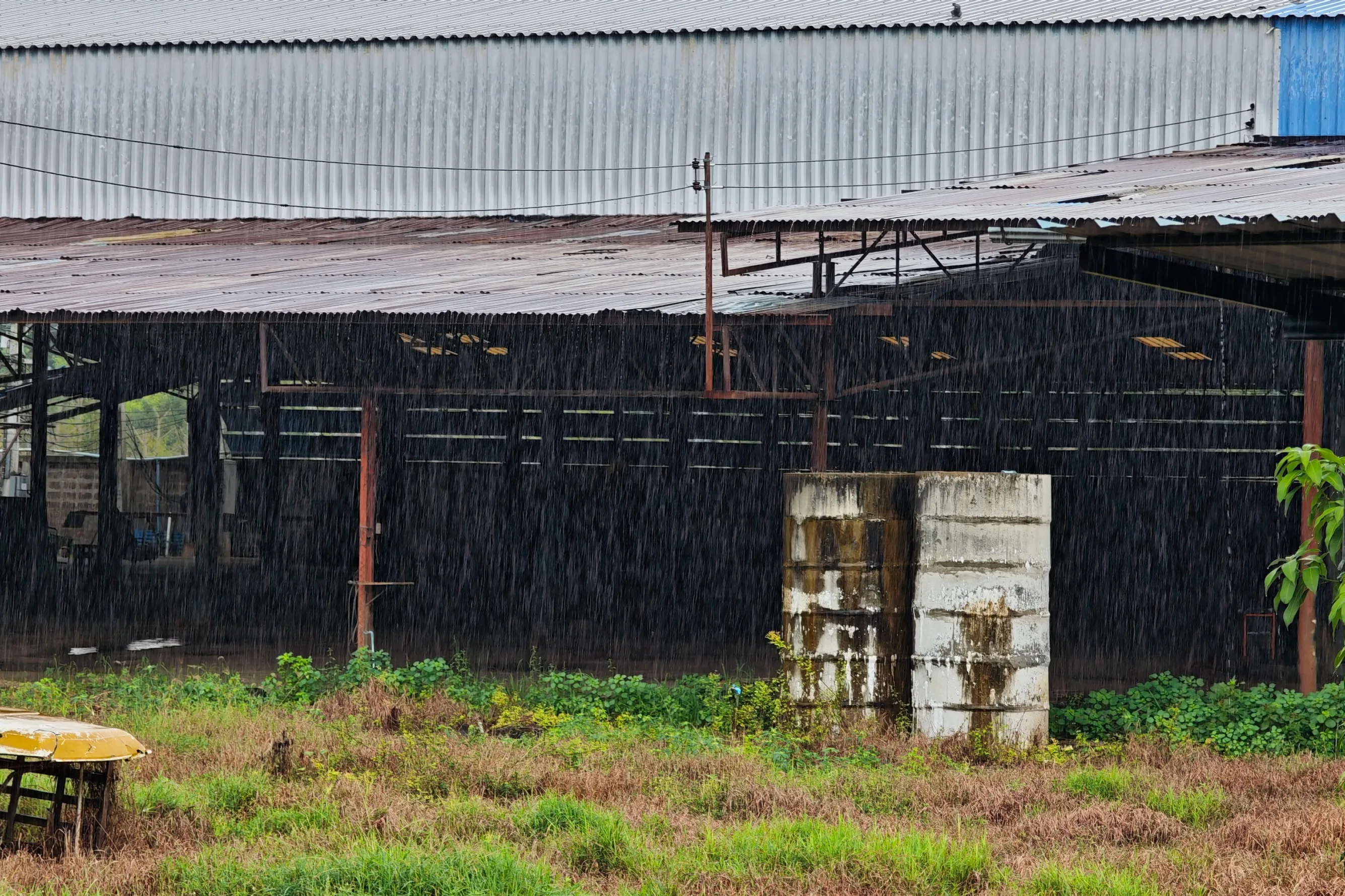 the warehouse my hosts use to run a tractor repair business. I love how this photo captures the intensity of the rain