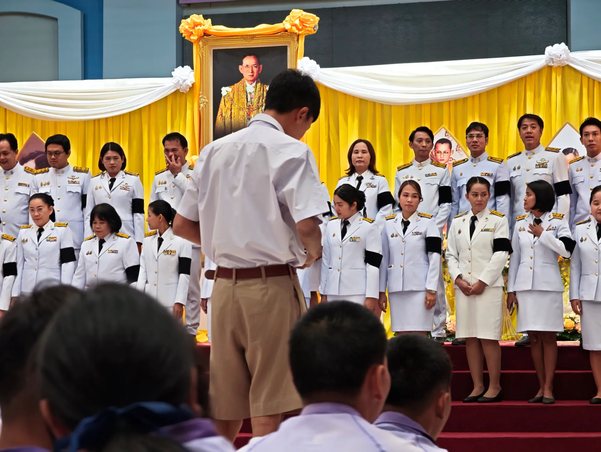 the teachers all lined up for father’s day. my friend job is in the middle, to take their photo.