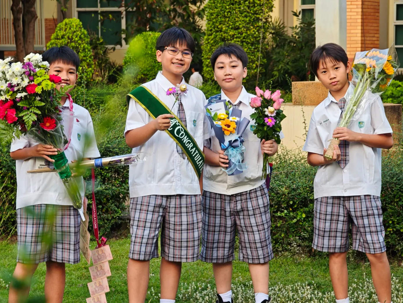 my host brother (middle-left) with his friends from school for the graduation day